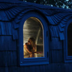 Interior of a triple wood fired sauna with spacious seating