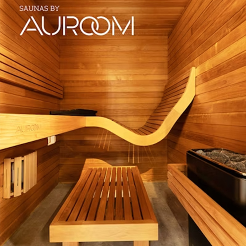 Auroom Baia modern indoor sauna with contoured bench seating in thermo-aspen finish