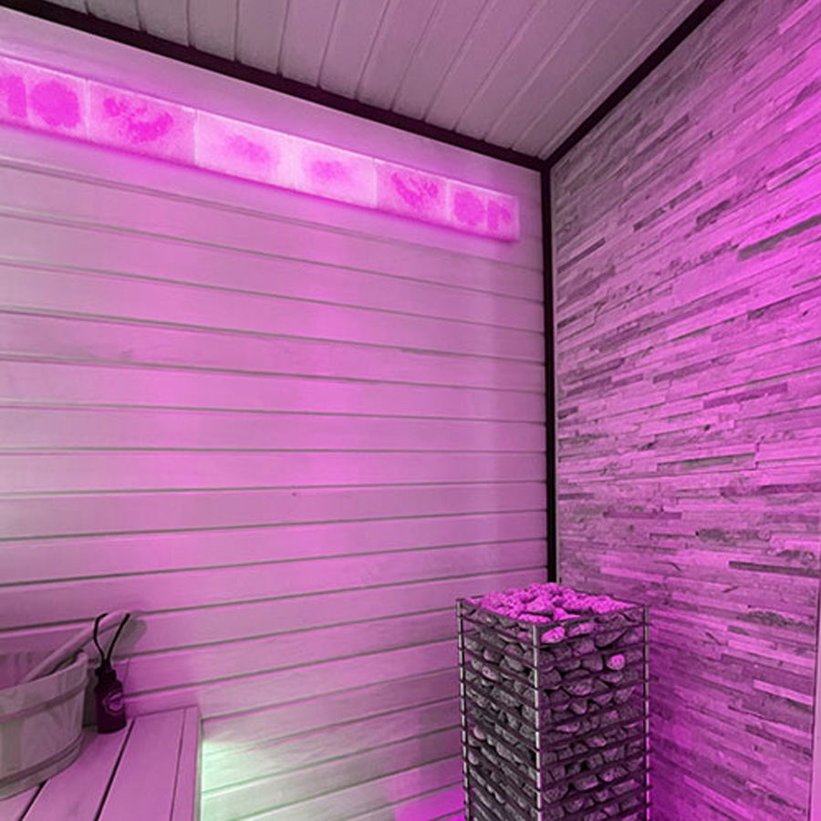 Himalayan salt sauna wall lighting up a modern sauna interior