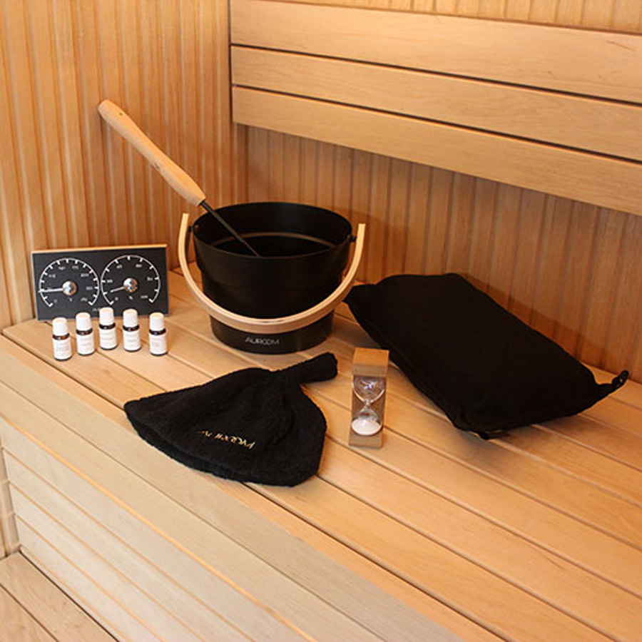 Auroom sauna accessory kit displayed inside premium sauna