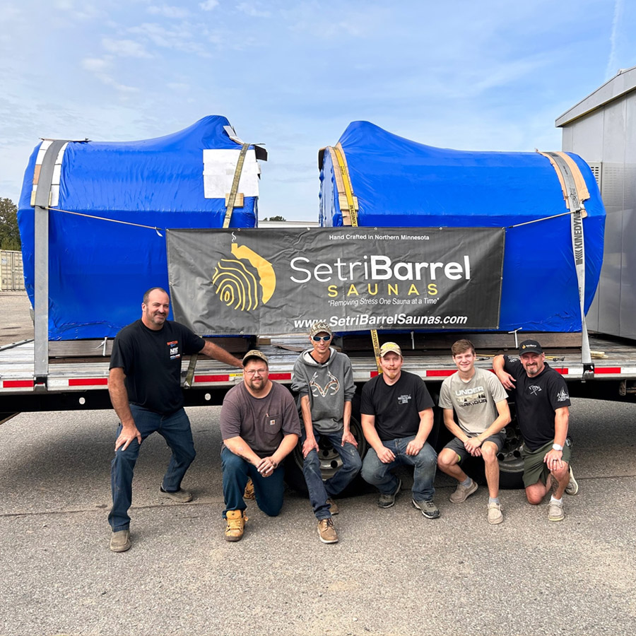 Happy family enjoying their Setri Barrel Sauna from Cedar Sense