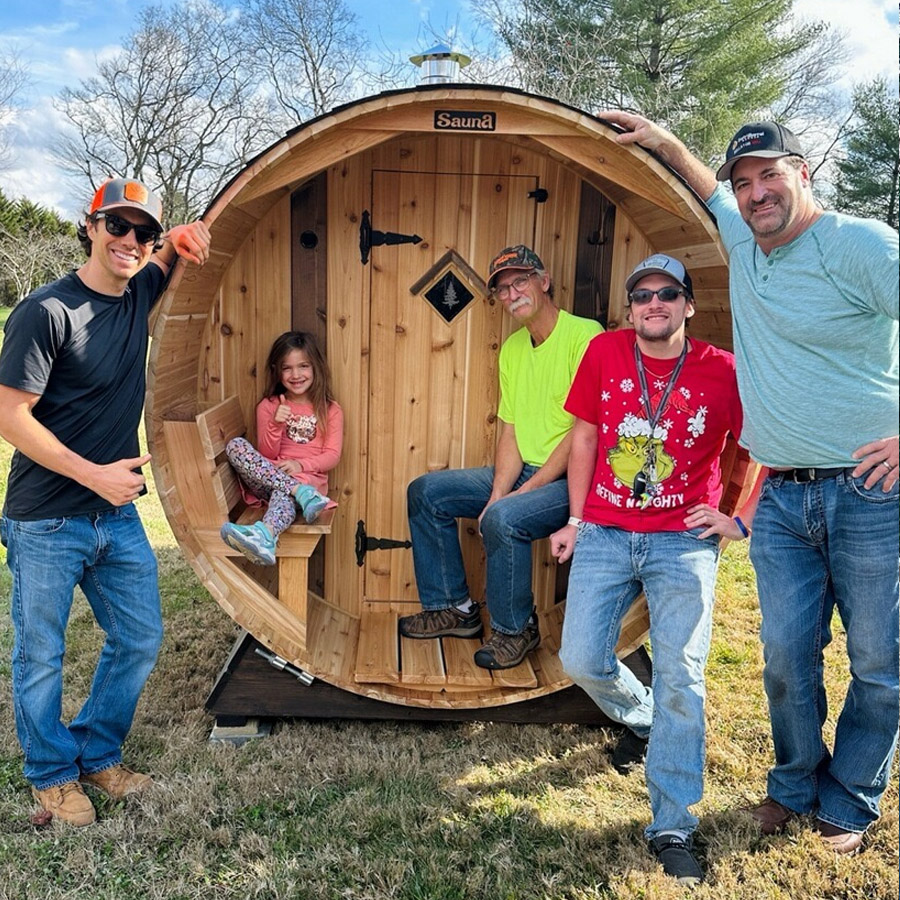 Family enjoying Cedar Sense barrel sauna