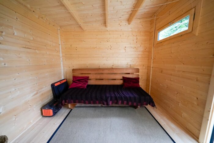 Light stain finish on modern backyard wood shed