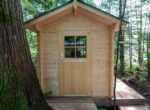 Small shed paired with a bunkie for outdoor bathroom use