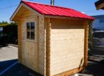 Backyard shed next to bunkie for cabin support space