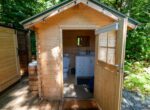 Compact bathroom shed interior for cabin or off-grid property