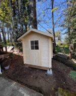 Small shed converted into a compact backyard sauna