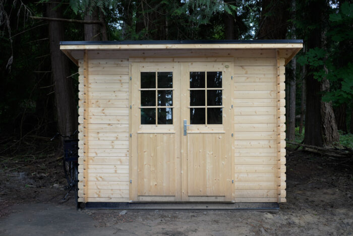 Outdoor storage shed for tools lawn equipment and garden gear
