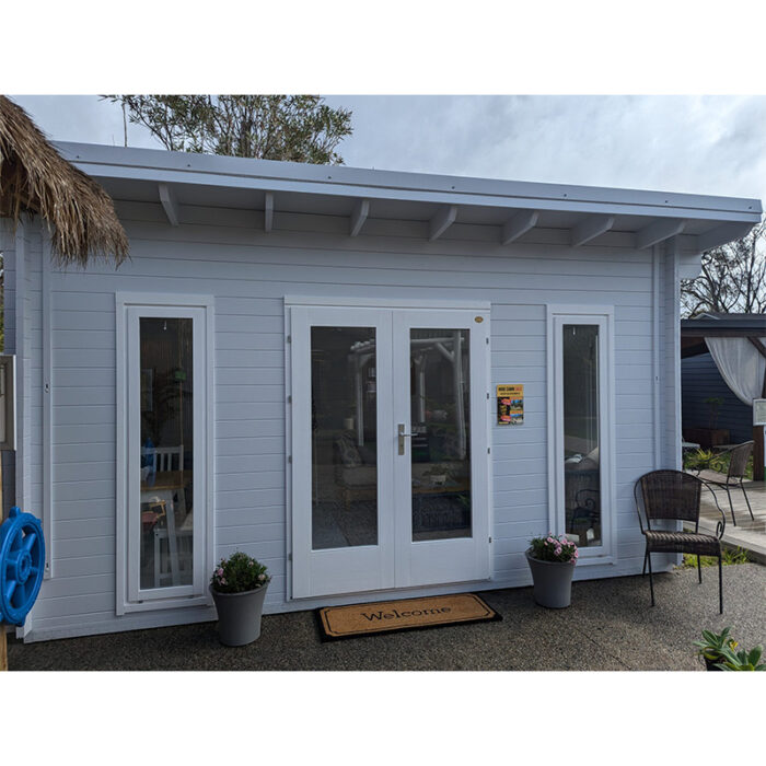 Modern backyard studio with monoslope roof