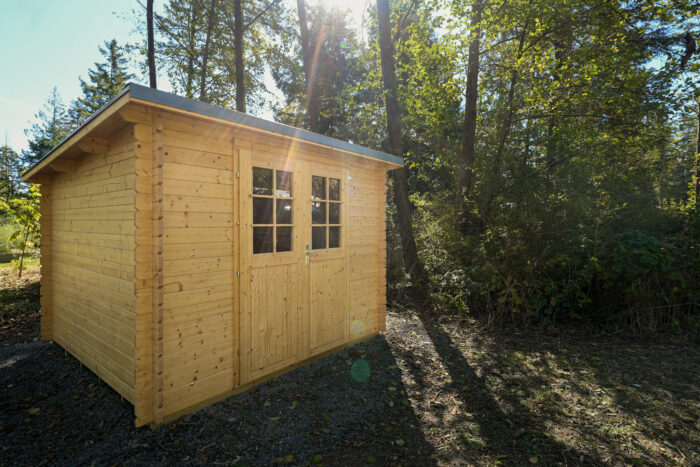 Stained interior of small backyard shed house