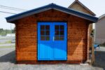 The Heartland Studio Bunkie DIY shed with double doors and window