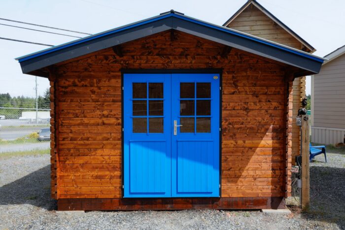 The Heartland Studio Bunkie DIY shed with double doors and window