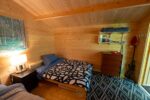 Garden shed office with bright white exterior finish