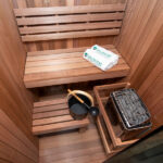 Canadian Timber indoor sauna with modern glass front design