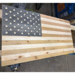 Handcrafted wooden sauna flag made from Norway pine, white pine, and western red cedar
