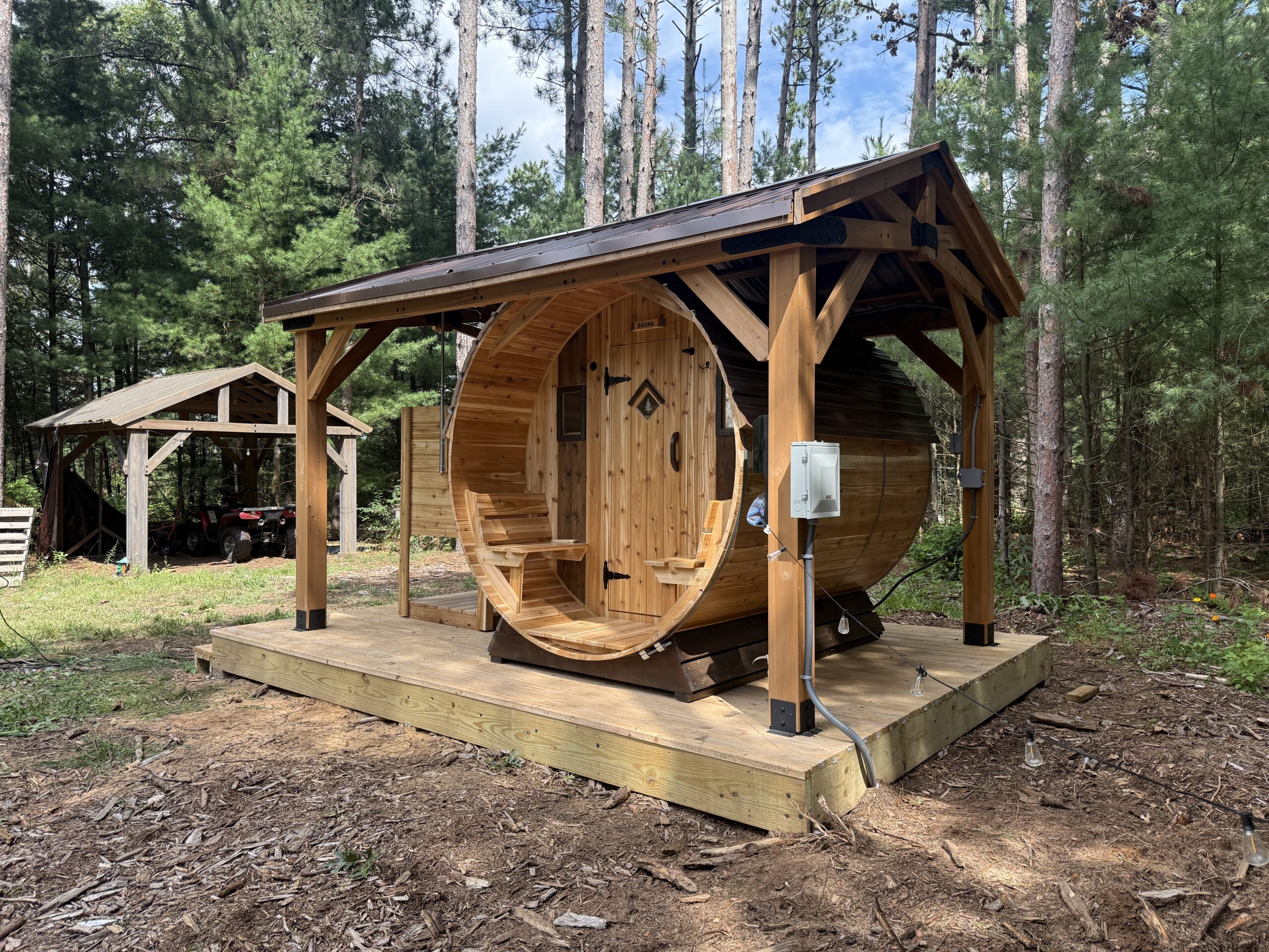 Right angle view of the BMOC sauna and outdoor shower setup