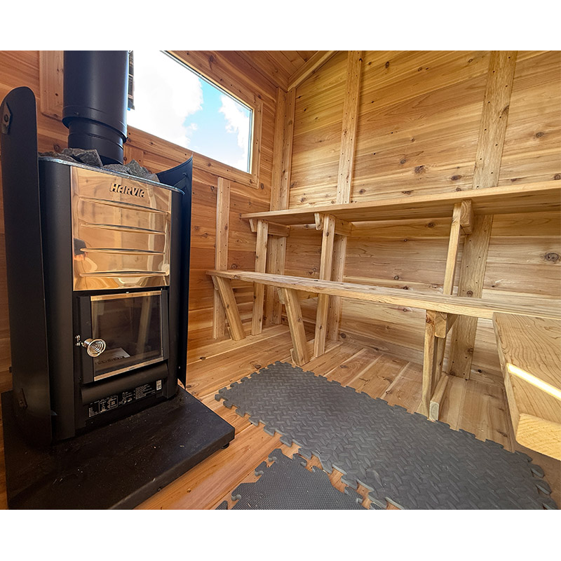 Harvia M3 wood-burning heater inside the Nordheim Loki sauna