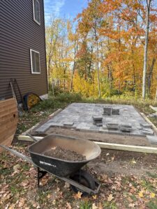 Prepared foundation before Cody's barrel sauna kit assembly in Wisconsin