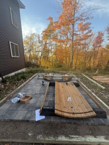 Beginning assembly of the base of Cody's barrel sauna kit